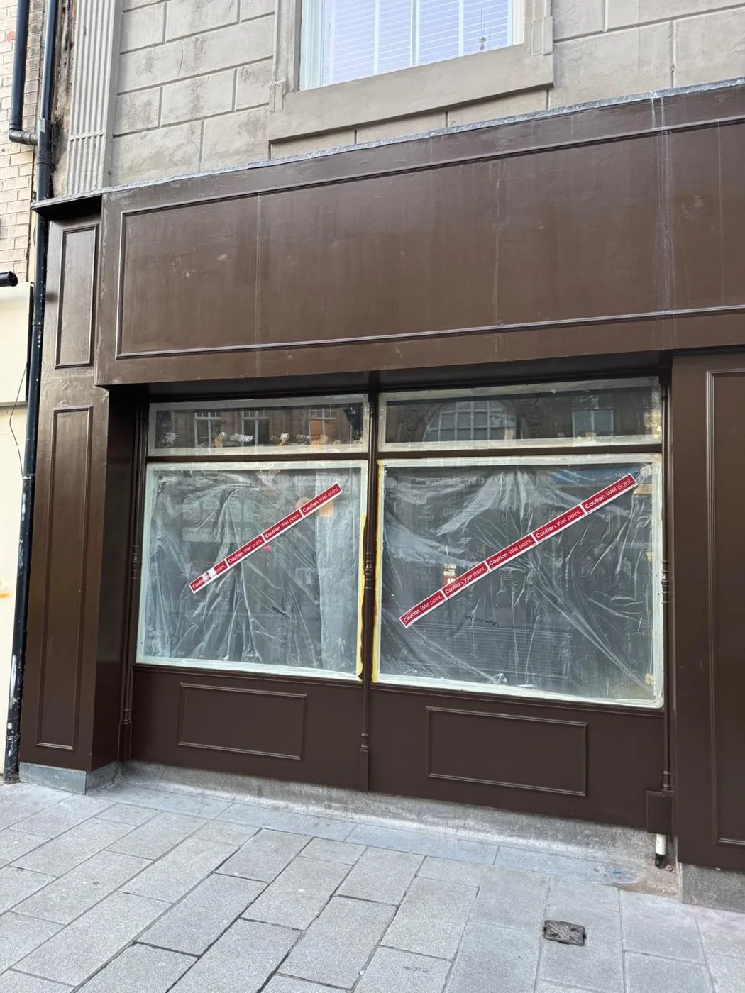 Completed commercial shopfront installation by Shopfronts and Shutters UK